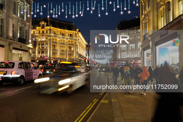 Traffic is on Oxford Street in London, United Kingdom, on November 5, 2024. 