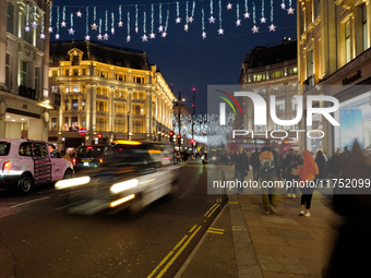 Traffic is on Oxford Street in London, United Kingdom, on November 5, 2024. (