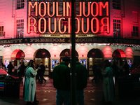 The Piccadilly Theatre reflects in a glass window in London, England, on November 7, 2024. (