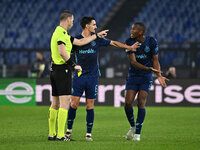 Referee Georgi Kabakov (BUL) and Tiago Djalo of F.C. Porto are present during the UEFA Europa League 2024/25 League Phase MD4 match between...