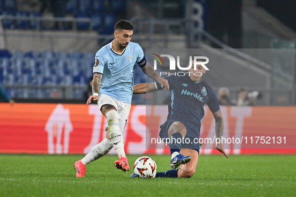 Nehuen Perez of F.C. Porto and Mattia Zaccagni of S.S. Lazio are in action during the UEFA Europa League 2024/25 League Phase MD4 match betw...