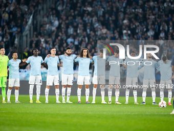 Players of SS Lazio observe a minute of silence in memory of the victims of lood in Valencia during the UEFA Europa League 2024/25 League Ph...