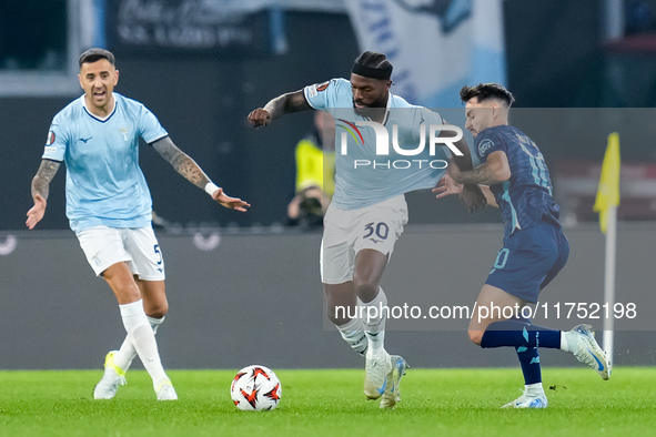 Nuno Tavares of SS Lazio and Fabio Vieira of FC Porto compete for the ball during the UEFA Europa League 2024/25 League Phase MD4 match betw...