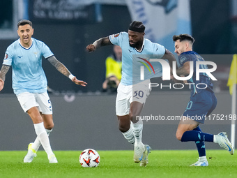 Nuno Tavares of SS Lazio and Fabio Vieira of FC Porto compete for the ball during the UEFA Europa League 2024/25 League Phase MD4 match betw...