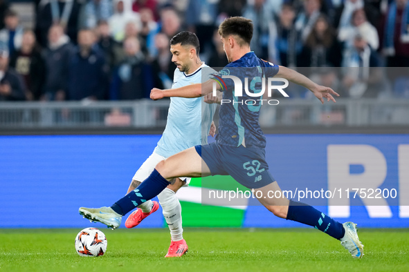 Mattia Zaccagni of SS Lazio and Martim Fernandes of FC Porto compete for the ball during the UEFA Europa League 2024/25 League Phase MD4 mat...