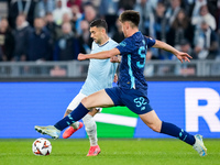 Mattia Zaccagni of SS Lazio and Martim Fernandes of FC Porto compete for the ball during the UEFA Europa League 2024/25 League Phase MD4 mat...