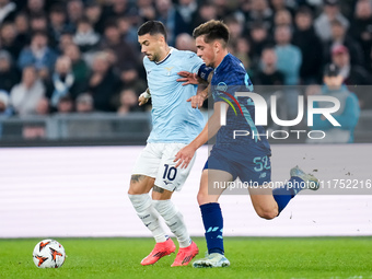 Mattia Zaccagni,and Martim Fernandes of FC Porto compete for the ball during the UEFA Europa League 2024/25 League Phase MD4 match between S...