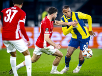 AZ Alkmaar defender Mees de Wit and Fenerbahce defender Rodrigo Becao play during the match between AZ and Fenerbahce at the AFAS stadium fo...