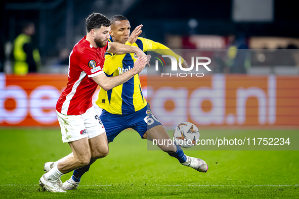 AZ Alkmaar defender Mees de Wit and Fenerbahce defender Rodrigo Becao play during the match between AZ and Fenerbahce at the AFAS stadium fo...