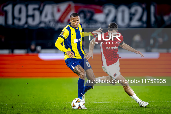 AZ Alkmaar defender Mees de Wit and Fenerbahce defender Rodrigo Becao play during the match between AZ and Fenerbahce at the AFAS stadium fo...