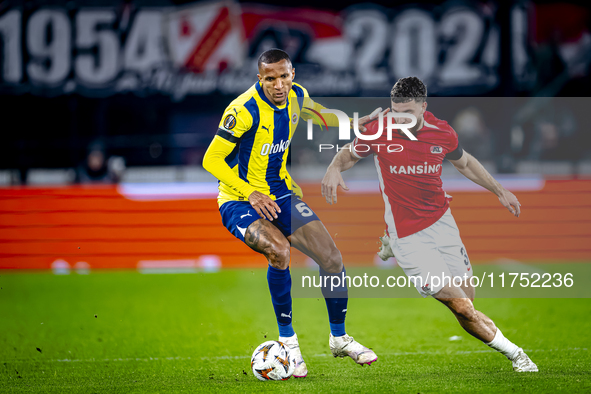 AZ Alkmaar defender Mees de Wit and Fenerbahce defender Rodrigo Becao play during the match between AZ and Fenerbahce at the AFAS stadium fo...