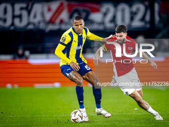 AZ Alkmaar defender Mees de Wit and Fenerbahce defender Rodrigo Becao play during the match between AZ and Fenerbahce at the AFAS stadium fo...