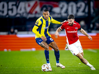 AZ Alkmaar defender Mees de Wit and Fenerbahce defender Rodrigo Becao play during the match between AZ and Fenerbahce at the AFAS stadium fo...