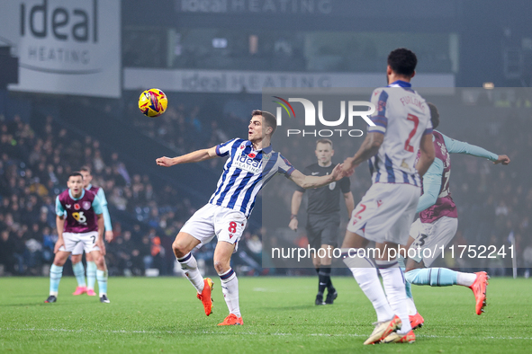 Jayson Molumby of WBA attempts to clear the ball overhead during the Sky Bet Championship match between West Bromwich Albion and Burnley at...