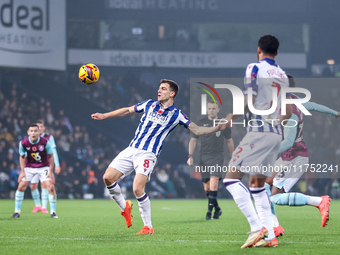 Jayson Molumby of WBA attempts to clear the ball overhead during the Sky Bet Championship match between West Bromwich Albion and Burnley at...