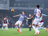 Jayson Molumby of WBA attempts to clear the ball overhead during the Sky Bet Championship match between West Bromwich Albion and Burnley at...