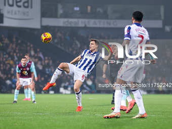 Jayson Molumby of WBA attempts to clear the ball overhead during the Sky Bet Championship match between West Bromwich Albion and Burnley at...