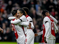 AFC Ajax Amsterdam forward Steven Berghuis and AFC Ajax Amsterdam midfielder Kian Fitz-Jim celebrate the 5-0 goal during the match between A...