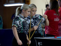 Twin sisters Carrie and Megan Randle from the Blackball Federation of Ireland national ladies doubles team react during a doubles ladies eve...