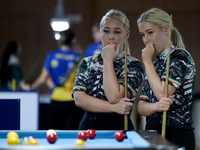 Twin sisters Carrie and Megan Randle from the Blackball Federation of Ireland national ladies doubles team react during a doubles ladies eve...