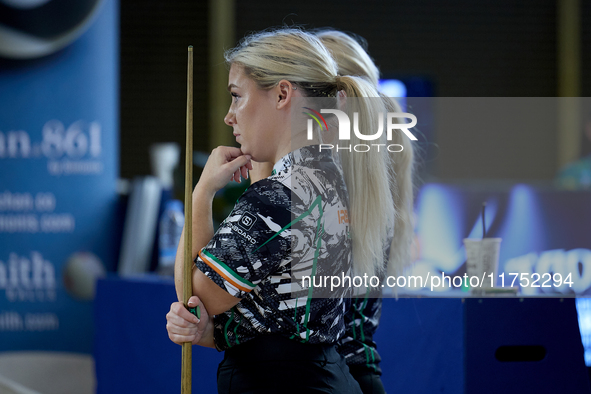 Twin sisters Carrie (front) and Megan (mostly hidden in picture) Randle from the Blackball Federation of Ireland national ladies doubles tea...