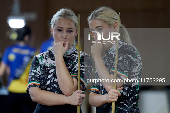 Twin sisters Carrie and Megan Randle from the Blackball Federation of Ireland national ladies doubles team react during a doubles ladies eve...