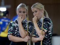 Twin sisters Carrie and Megan Randle from the Blackball Federation of Ireland national ladies doubles team react during a doubles ladies eve...