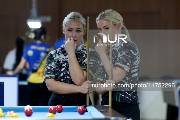 Twin sisters Carrie and Megan Randle from the Blackball Federation of Ireland national ladies doubles team react during a doubles ladies eve...