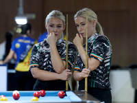 Twin sisters Carrie and Megan Randle from the Blackball Federation of Ireland national ladies doubles team react during a doubles ladies eve...