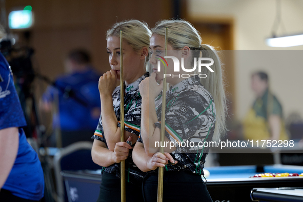 Twin sisters Megan and Carrie Randle from the Blackball Federation of Ireland national ladies doubles team react during a doubles ladies eve...