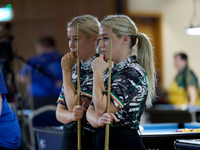 Twin sisters Megan and Carrie Randle from the Blackball Federation of Ireland national ladies doubles team react during a doubles ladies eve...