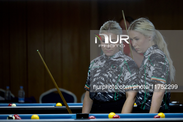 Twin sisters Carrie and Megan Randle from the Blackball Federation of Ireland national ladies doubles team react during a doubles ladies eve...