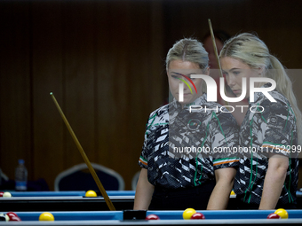 Twin sisters Carrie and Megan Randle from the Blackball Federation of Ireland national ladies doubles team react during a doubles ladies eve...