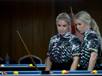 Twin sisters Carrie and Megan Randle from the Blackball Federation of Ireland national ladies doubles team react during a doubles ladies eve...