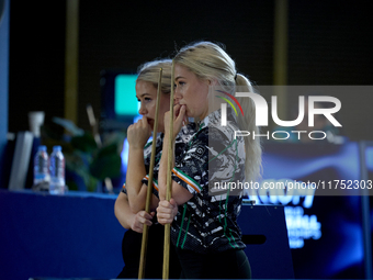 Twin sisters Carrie and Megan Randle from the Blackball Federation of Ireland national ladies doubles team react during a doubles ladies eve...