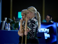 Twin sisters Carrie and Megan Randle from the Blackball Federation of Ireland national ladies doubles team react during a doubles ladies eve...