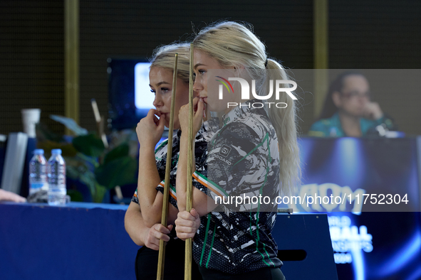 Twin sisters Carrie and Megan Randle from the Blackball Federation of Ireland national ladies doubles team react during a doubles ladies eve...