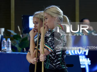 Twin sisters Carrie and Megan Randle from the Blackball Federation of Ireland national ladies doubles team react during a doubles ladies eve...