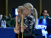 Twin sisters Carrie and Megan Randle from the Blackball Federation of Ireland national ladies doubles team react during a doubles ladies eve...