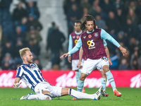 #20, Uros Racic of WBA gets his toe to the ball to deny #30, Luca Koleosho of Burnley possession during the Sky Bet Championship match betwe...