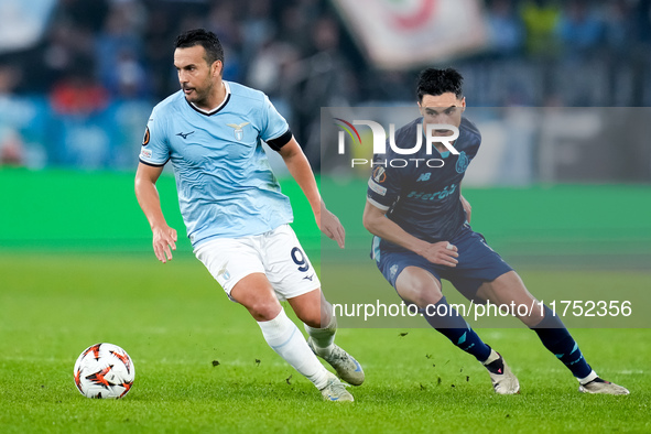 Pedro of SS Lazio and Stephen Eustaquio of FC Porto compete for the ball during the UEFA Europa League 2024/25 League Phase MD4 match betwee...