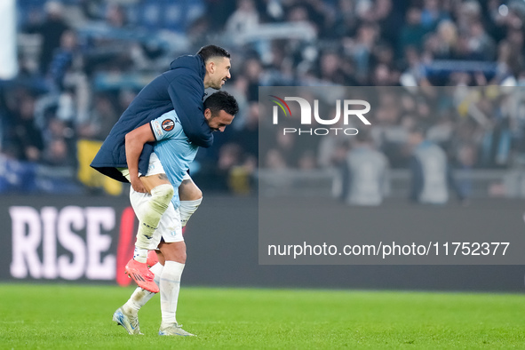 Mattia Zaccagni of SS Lazio celebrates the victory with Pedro at the end of the UEFA Europa League 2024/25 League Phase MD4 match between SS...