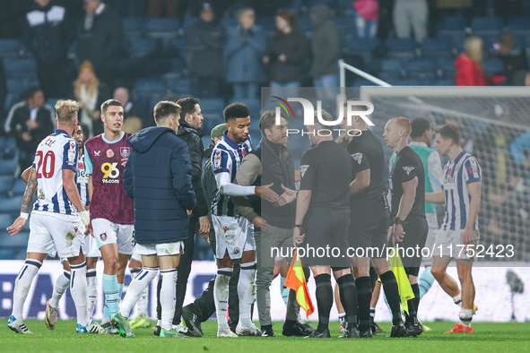 Scott Parker, manager of Burnley, speaks to the officials following the final whistle during the Sky Bet Championship match between West Bro...