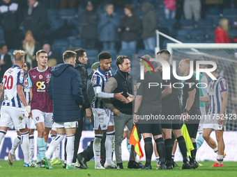 Scott Parker, manager of Burnley, speaks to the officials following the final whistle during the Sky Bet Championship match between West Bro...