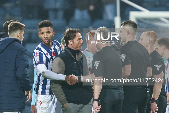 Scott Parker, manager of Burnley, speaks to the officials following the final whistle during the Sky Bet Championship match between West Bro...