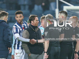 Scott Parker, manager of Burnley, speaks to the officials following the final whistle during the Sky Bet Championship match between West Bro...