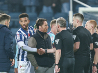 Scott Parker, manager of Burnley, speaks to the officials following the final whistle during the Sky Bet Championship match between West Bro...