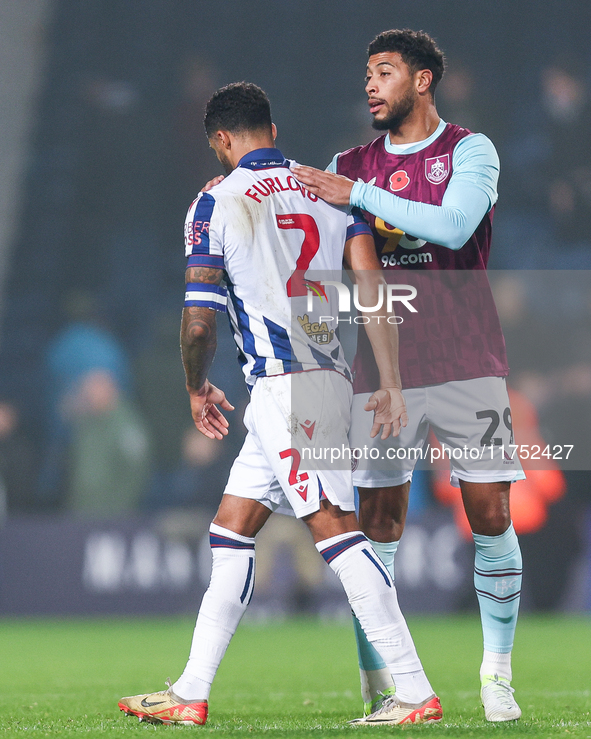 #2, Darnell Furlong of WBA and #29, Josh Laurent of Burnley participate in the Sky Bet Championship match between West Bromwich Albion and B...