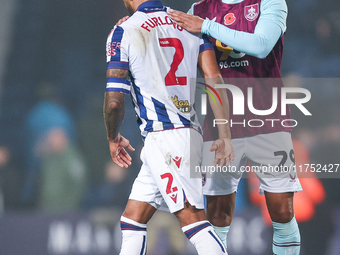 #2, Darnell Furlong of WBA and #29, Josh Laurent of Burnley participate in the Sky Bet Championship match between West Bromwich Albion and B...