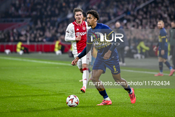 Maccabi Tel Aviv defender Tyrese Asante plays during the match between Ajax and Maccabi Tel Aviv at the Johan Cruijff ArenA for the UEFA Eur...